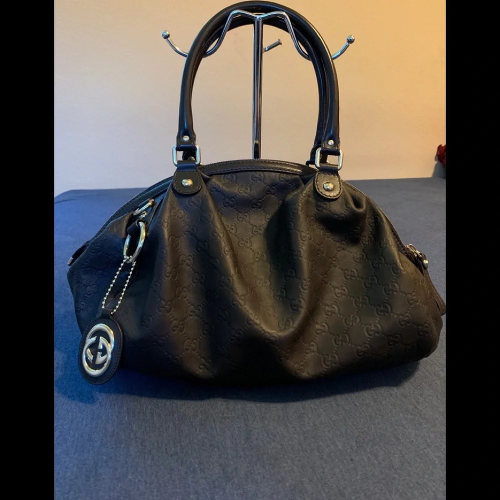 Gucci Black Embossed GG Shoulder Bag with Logo Charm